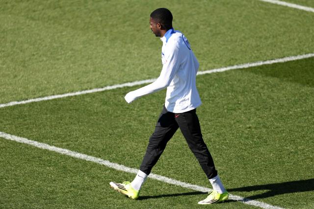 Paris Saint-Germain's French forward #10 Ousmane Dembele arrives for a training session at the Campus Paris Saint-Germain in Poissy, on the western outskirts of Paris on April 7, 2026, on the eve of the UEFA Champions League quarter-final first leg football match against Liverpool F.C. (Photo by FRANCK FIFE / AFP)