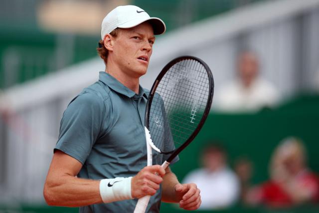 Italy's Jannik Sinner reacts as he plays against France's Ugo Humbert during the Monte Carlo ATP Masters Series Tournament round of 64 tennis match on Court Rainier III at the Monte-Carlo Country Club in Roquebrune-Cap-Martin, south-eastern France on April 7, 2026. (Photo by Valery HACHE / AFP)