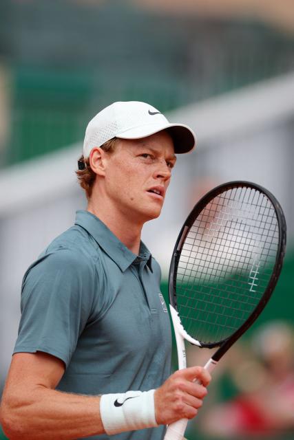 Italy's Jannik Sinner reacts as he plays against France's Ugo Humbert during the Monte Carlo ATP Masters Series Tournament round of 64 tennis match on Court Rainier III at the Monte-Carlo Country Club in Roquebrune-Cap-Martin, south-eastern France on April 7, 2026. (Photo by Valery HACHE / AFP)