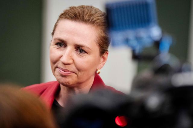 Denmark's acting Prime Minister Mette Frederiksen speaks with journalists to comment on the situation in Iran and the Strait of Hormuz, in front of the Prime Minister's Office in the Danish Parliament, Christiansborg, in Copenhagen, Denmark, on April 7, 2026. (Photo by Sebastian Elias Uth / Ritzau Scanpix / AFP) / Denmark OUT