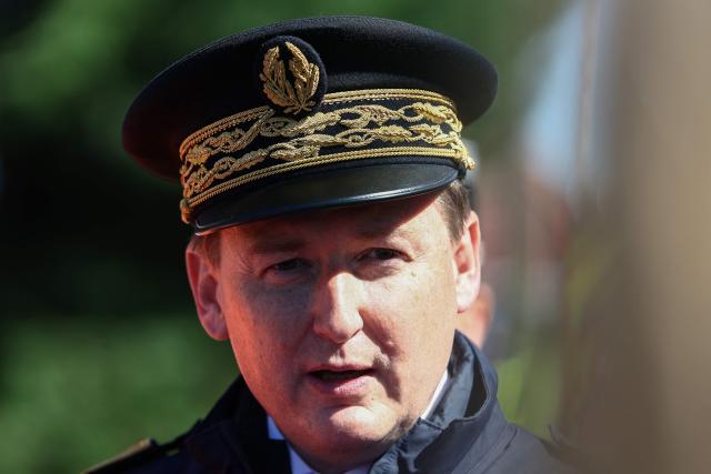 Prefect of the Herault department François-Xavier Lauch addresses media after a collision of a TGV train at a level crossing with a lorry between Bethune and Lens, in Bully-les-Mines, in the Pas-de-Calais region, northern France on April 7, 2026. The driver of the TGV train died and 27 people were injured in the accident, AFP has learnt from the prefecture and the SNCF. (Photo by Sameer AL-DOUMY / AFP)