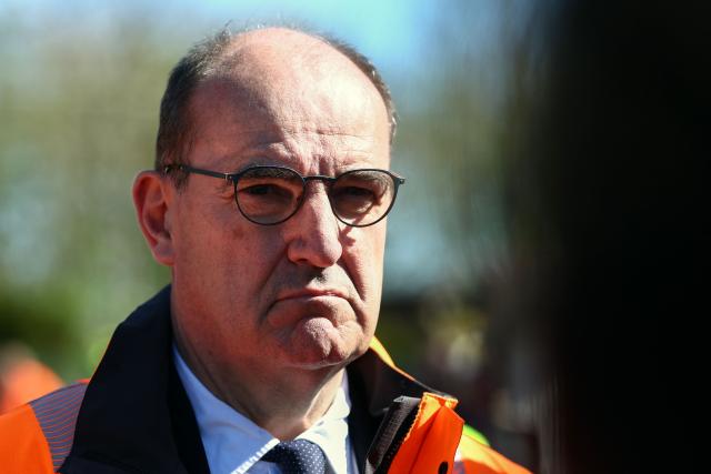 President of French railway company SNCF Jean Castex addresses media after a collision of a TGV train at a level crossing with a lorry between Bethune and Lens, in Bully-les-Mines, in the Pas-de-Calais region, northern France on April 7, 2026. The driver of the TGV train died and 27 people were injured in the accident, AFP has learnt from the prefecture and the SNCF. (Photo by Sameer AL-DOUMY / AFP)