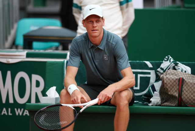 Italy's Jannik Sinner sits between games as he plays against France's Ugo Humbert during the Monte Carlo ATP Masters Series Tournament round of 64 tennis match on Court Rainier III at the Monte-Carlo Country Club in Roquebrune-Cap-Martin, south-eastern France on April 7, 2026. (Photo by Valery HACHE / AFP)