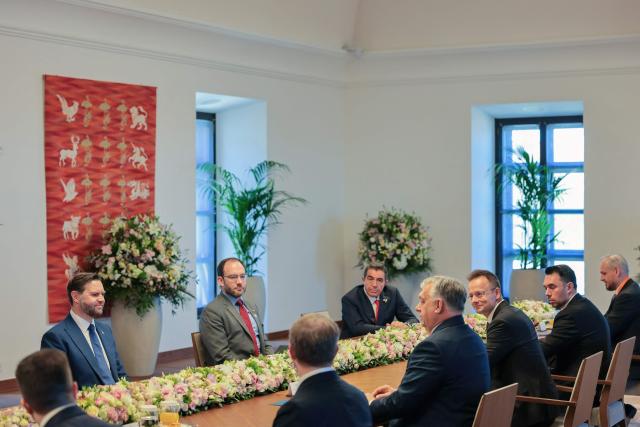 US Vice President JD Vance (2ndL), Hungarian Prime Minister Viktor Orban (4thR), Hungarian Foreign Minister Peter Szijjarto (3rdR) and other members of the delegations attend a meeting in Budapest, Hungary, on April 7, 2026. (Photo by Jonathan Ernst / POOL / AFP)