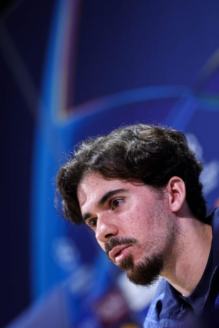 Paris Saint-Germain's Portuguese midfielder #17 Vitinha addresses media representatives during a press conference at the Campus Paris Saint-Germain in Poissy, on the western outskirts of Paris on April 7, 2026, on the eve of the UEFA Champions League quarter-final first leg football match against Liverpool F.C. (Photo by FRANCK FIFE / AFP)