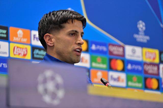 Barcelona's Portuguese defender #02 Joao Cancelo gives a press conference on the eve of their UEFA Champions League quarter final football match against Club Atletico de Madrid at the Joan Gamper training ground in Sant Joan Despi, near Barcelona, on April 7, 2026. (Photo by MANAURE QUINTERO / AFP)
