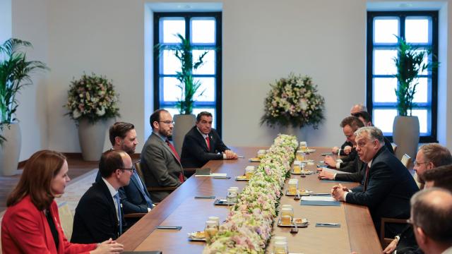 US Vice President JD Vance (3ndL), Hungarian Prime Minister Viktor Orban (4thR), Hungarian Foreign Minister Peter Szijjarto (5thR) and other members of the delegations attend a meeting in Budapest, Hungary, on April 7, 2026. (Photo by Jonathan Ernst / POOL / AFP)