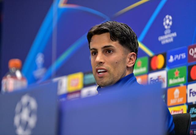 Barcelona's Portuguese defender #02 Joao Cancelo gives a press conference on the eve of their UEFA Champions League quarter final football match against Club Atletico de Madrid at the Joan Gamper training ground in Sant Joan Despi, near Barcelona, on April 7, 2026. (Photo by MANAURE QUINTERO / AFP)