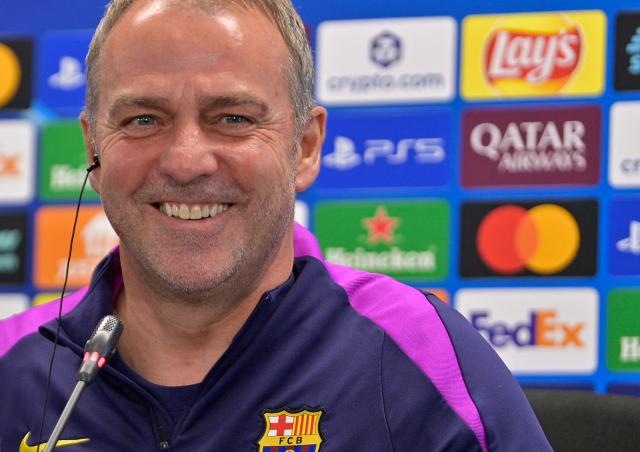 Barcelona's German coach Hans-Dieter Flick smiles during a press conference on the eve of their UEFA Champions League quarter final football match against Club Atletico de Madrid at the Joan Gamper training ground in Sant Joan Despi, near Barcelona, on April 7, 2026. (Photo by MANAURE QUINTERO / AFP)