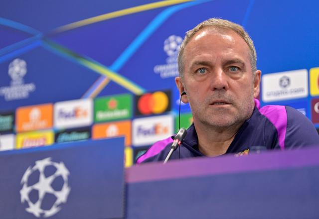 Barcelona's German coach Hans-Dieter Flick gives a press conference on the eve of their UEFA Champions League quarter final football match against Club Atletico de Madrid at the Joan Gamper training ground in Sant Joan Despi, near Barcelona, on April 7, 2026. (Photo by MANAURE QUINTERO / AFP)
