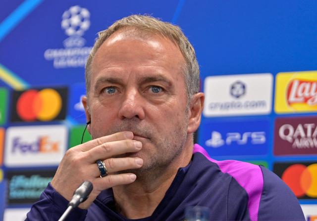 Barcelona's German coach Hans-Dieter Flick gives a press conference on the eve of their UEFA Champions League quarter final football match against Club Atletico de Madrid at the Joan Gamper training ground in Sant Joan Despi, near Barcelona, on April 7, 2026. (Photo by MANAURE QUINTERO / AFP)