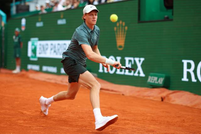 Italy's Jannik Sinner eyes the ball as he plays against France's Ugo Humbert during the Monte Carlo ATP Masters Series Tournament round of 64 tennis match on Court Rainier III at the Monte-Carlo Country Club in Roquebrune-Cap-Martin, south-eastern France on April 7, 2026. (Photo by Valery HACHE / AFP)