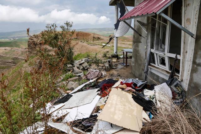 A photograph shows the damage after a drone crashed into a house in the village of Zargazawi, north of Erbil in Iraq's northern autonomous Kurdistan region, on April 7, 2026. Local authorities reported a deadly drone incident in a civilian area in the early hours of April 7. The autonomous region's Counter-Terrorism Service said a "bomb-laden drone coming from Iran" crashed into a home in the Dara Shakran subdistrict of Erbil province after midnight, killing a couple. Since the Middle East war erupted on February 28, shadowy Iraq-based groups have been claiming near daily attacks on US interests in the country and beyond. (Photo by Safin HAMID / AFP)