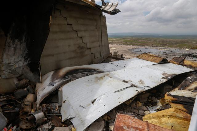 A photograph shows the damage after a drone crashed into a house in the village of Zargazawi, north of Erbil in Iraq's northern autonomous Kurdistan region, on April 7, 2026. Local authorities reported a deadly drone incident in a civilian area in the early hours of April 7. The autonomous region's Counter-Terrorism Service said a "bomb-laden drone coming from Iran" crashed into a home in the Dara Shakran subdistrict of Erbil province after midnight, killing a couple. Since the Middle East war erupted on February 28, shadowy Iraq-based groups have been claiming near daily attacks on US interests in the country and beyond. (Photo by Safin HAMID / AFP)