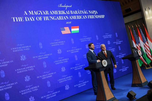 US Vice President JD Vance (L) and Hungarian Prime Minister Viktor Orban shake hands during a joint press conference at the Carmelite Monastery of Buda, seat of the Hungarian premier, in Budapest on April 7, 2026. US Vice President JD Vance arrived in Hungary to deliver the US President's support to his ally, nationalist Prime Minister Viktor Orban, ahead of tightly contested parliamentary elections scheduled for April 12, 2026. (Photo by Jonathan Ernst / POOL / AFP)
