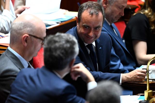 France's Prime Minister Sebastien Lecornu reacts during a session of questions to the government at The National Assembly, France's lower house of parliament in Paris on April 7, 2026. (Photo by JULIEN DE ROSA / AFP)