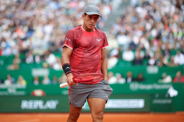 Argentina's Sebastian Baez looks on as he plays against Spain's Carlos Alcaraz during the Monte Carlo ATP Masters Series Tournament round of 64 tennis match on Court Rainier III at the Monte-Carlo Country Club in Roquebrune-Cap-Martin, south-eastern France on April 7, 2026. (Photo by Valery HACHE / AFP)