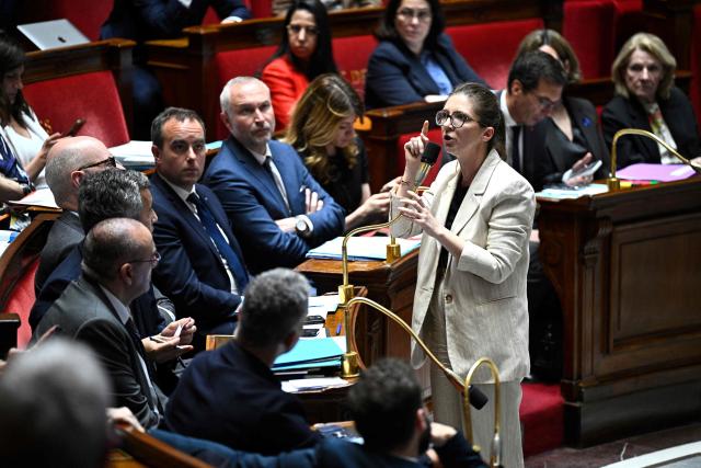 France's junior Minister in charge of equality Aurore Berge answers during a session of questions to the government at The National Assembly, France's lower house of parliament in Paris on April 7, 2026. (Photo by JULIEN DE ROSA / AFP)