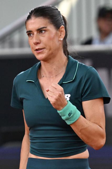 Romania's Sorana Cirstea reacts as she plays against Austria's Sinja Kraus during their women's singles match of the WAT Upper Austria Ladies Linz tennis tournament in Linz, Austria on April 7, 2026. Yastremska won the match 7-5, 4-6 and 6-3. (Photo by BARBARA GINDL / APA / AFP) / Austria OUT