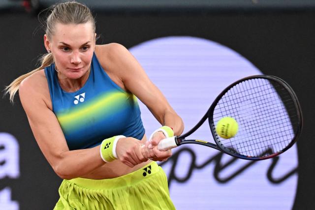 Ukraine's Dayana Yastremska hits a return to USA's Ann Li during their women's singles match of the WTA Upper Austria Ladies Linz tennis tournament in Linz, Austria on April 7, 2026. (Photo by BARBARA GINDL / APA / AFP) / Austria OUT