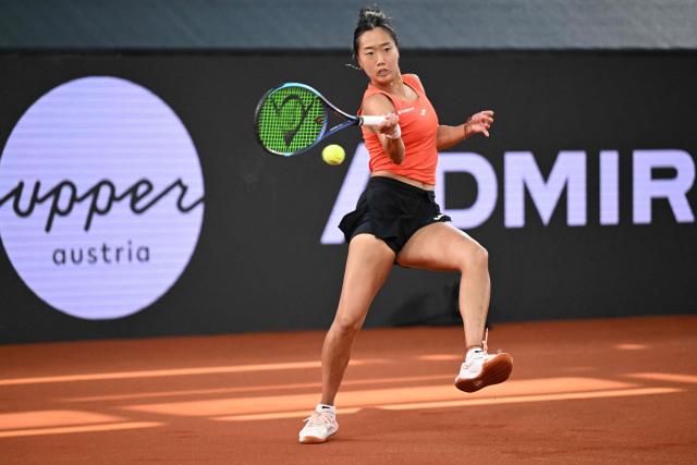 USA's Ann Li returns the ball to Ukraine's Dayana Yastremska during their women's singles match of the WTA Upper Austria Ladies Linz tennis tournament in Linz, Austria on April 7, 2026. Yastremska won the match 7-5, 4-6 and 6-3. (Photo by BARBARA GINDL / APA / AFP) / Austria OUT