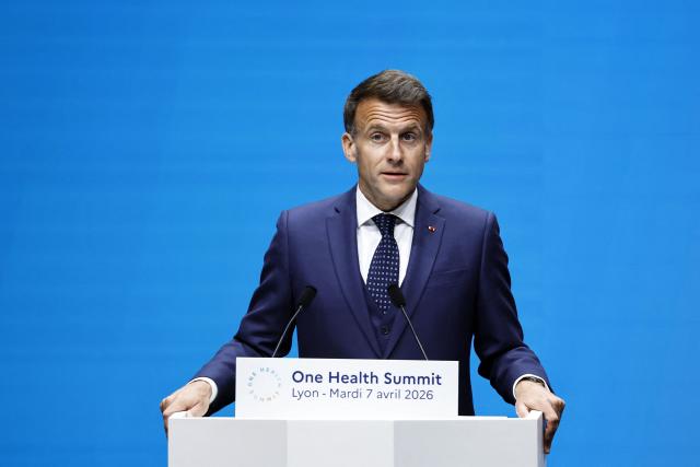 France's President Emmanuel Macron delivers his speech during the opening session of "One Health Summit" high-level meeting in Lyon, southern France on April 7, 2026, on the occasion of World Health Day. (Photo by Christophe PETIT TESSON / POOL / AFP)