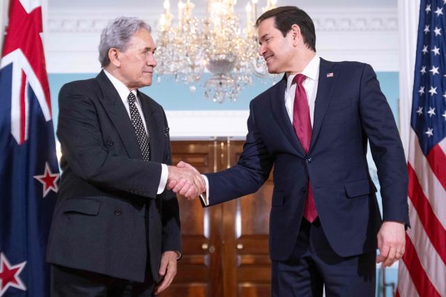 US Secretary of State Marco Rubio (R) shakes hands with New Zealand Foreign Minister Winston Peters (L) prior to meetings at the State Department in Washington, DC, on April 7, 2026. (Photo by SAUL LOEB / AFP)