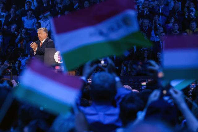 Hungarian Prime Minister Viktor Orban applauds during a rally supported by US Vice President JD Vance (not in picture) at the MTK Sportpark in Budapest on April 7, 2026. US Vice President JD Vance is in Hungary to deliver the US President's support to his ally, nationalist Prime Minister Viktor Orban, ahead of tightly contested parliamentary elections scheduled for April 12, 2026. (Photo by Jonathan Ernst / POOL / AFP)