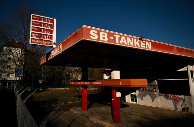 A photo shows a former petrol station with old petrol prices in Dortmund on April 7, 2026. Oil and natural gas prices have surged since the end of February 2026, when the United States and Israel began attacking Iran, plunging the Middle East into turmoil. (Photo by Ina FASSBENDER / AFP)