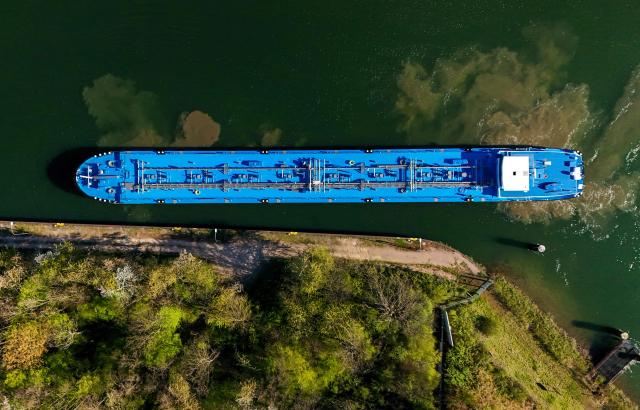 An aerial view shows a tanker near the fuel depot of Aral at the Ruhr Oel petroleum refineries of BP Gelsenkirchen GmbH in Gelsenkirchen, western Germany on April 7, 2026. The Iran war sent oil prices soaring on March 9, 2026 after Tehran, under new leader Mojtaba Khamenei, fired a new barrage of missiles at its Gulf neighbours and signalled that the strategic Strait of Hormuz would likely remain shut.
With the Strait of Hormuz off Iran remaining closed to almost all oil tankers, the price of benchmark crude oil contracts rocketed past $100 a barrel on Monday -- their highest levels since Russia's invasion of Ukraine in 2022 -- before edging back slightly. (Photo by Ina FASSBENDER / AFP)