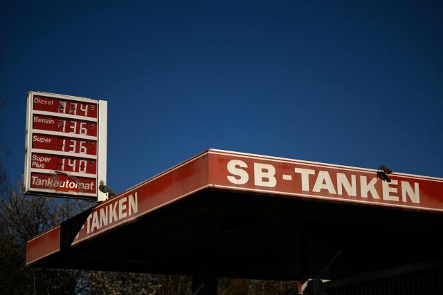 A photo shows a former petrol station with old petrol prices in Dortmund on April 7, 2026. Oil and natural gas prices have surged since the end of February 2026, when the United States and Israel began attacking Iran, plunging the Middle East into turmoil. (Photo by Ina FASSBENDER / AFP)