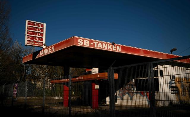 A photo shows a former petrol station with old petrol prices in Dortmund on April 7, 2026. Oil and natural gas prices have surged since the end of February 2026, when the United States and Israel began attacking Iran, plunging the Middle East into turmoil. (Photo by Ina FASSBENDER / AFP)