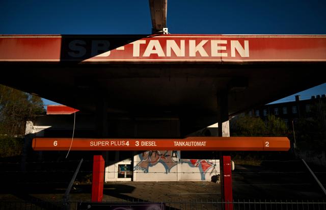 A photo shows a former petrol station with old petrol prices in Dortmund on April 7, 2026. Oil and natural gas prices have surged since the end of February 2026, when the United States and Israel began attacking Iran, plunging the Middle East into turmoil. (Photo by Ina FASSBENDER / AFP)