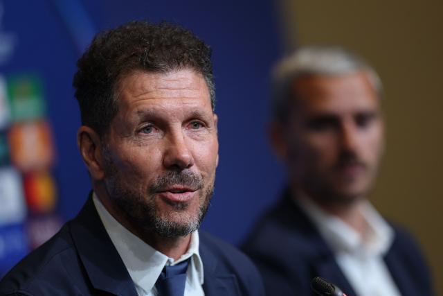Atletico Madrid's Argentine coach Diego Simeone looks on during a press conference on the eve of their UEFA Champions League quarter final football match against FC Barcelona at the Nou Camp stadium in Barcelona, on April 7, 2026. (Photo by Lluis GENE / AFP)