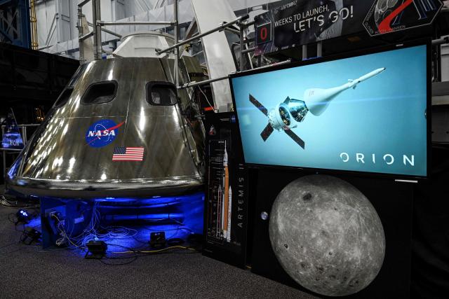 A mockup of the Orion spacecraft is seen on April 7, 2026 at Johnson Space Center in Houston, Texas. After completing their lunar flyby -- breaking the record for distance from Earth -- the Artemis II crew is bound for home, with splashdown due in the Pacific off the coast of California late April 10. (Photo by RONALDO SCHEMIDT / AFP)