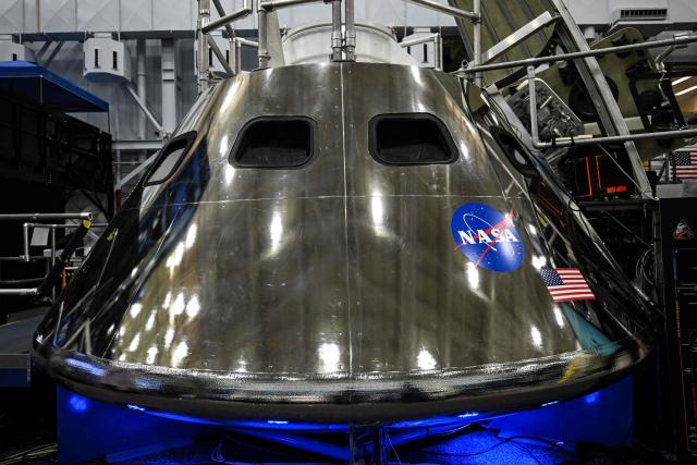 A mockup of the Orion spacecraft is seen on April 7, 2026 at Johnson Space Center in Houston, Texas. After completing their lunar flyby -- breaking the record for distance from Earth -- the Artemis II crew is bound for home, with splashdown due in the Pacific off the coast of California late April 10. (Photo by RONALDO SCHEMIDT / AFP)