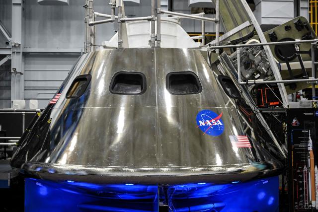 A mockup of the Orion spacecraft is seen on April 7, 2026 at Johnson Space Center in Houston, Texas. After completing their lunar flyby -- breaking the record for distance from Earth -- the Artemis II crew is bound for home, with splashdown due in the Pacific off the coast of California late April 10. (Photo by RONALDO SCHEMIDT / AFP)