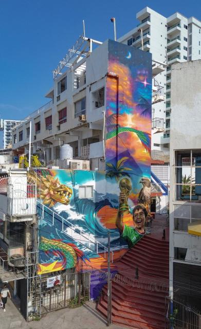 View of a mural by Mexican artist Ivan Bailon Hernandez titled "Sueno Mundialista" (World Cup dream), referring to the upcoming FIFA World Cup 2026, in Acapulco, Guerrero state, Mexico, on April 7, 2026. (Photo by Faustine FRANCISCO / AFP)