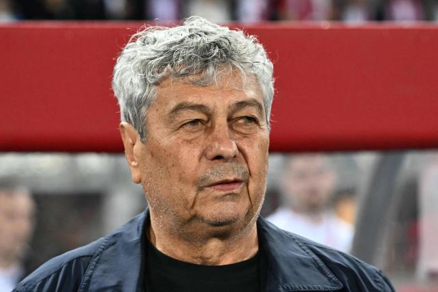 (FILES) Romania's head coach Mircea Lucescu is pictured prior to the 2026 FIFA World Cup Qualifying Group H football match between Austria and Romania in Vienna on June 7, 2025. Mircea Lucescu, died on April 7, 2026 from a heart attack, the Bucharest hospital where he was hospitalised announced in a statement. (Photo by Joe Klamar / AFP)
