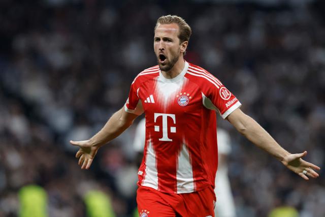 Bayern Munich's English forward #09 Harry Kane celebrates scoring his team's second goal during the UEFA Champions League quarter final first leg football match between Real Madrid CF and FC Bayern Munich at Santiago Bernabeu Stadium in Madrid on April 7, 2026. (Photo by Oscar DEL POZO / AFP)