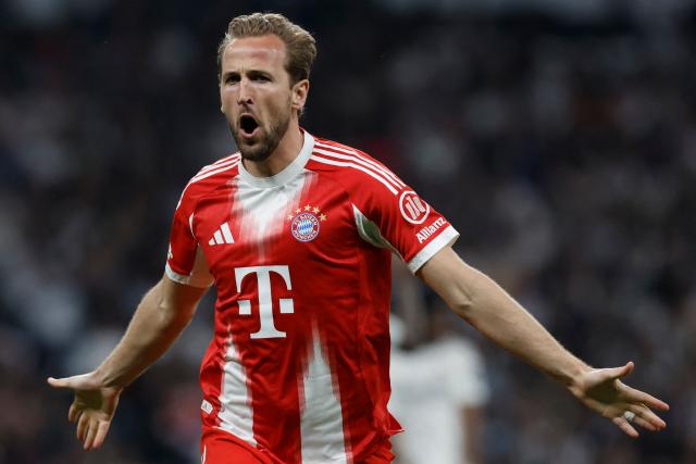Bayern Munich's English forward #09 Harry Kane celebrates scoring his team's second goal during the UEFA Champions League quarter final first leg football match between Real Madrid CF and FC Bayern Munich at Santiago Bernabeu Stadium in Madrid on April 7, 2026. (Photo by Oscar DEL POZO / AFP)