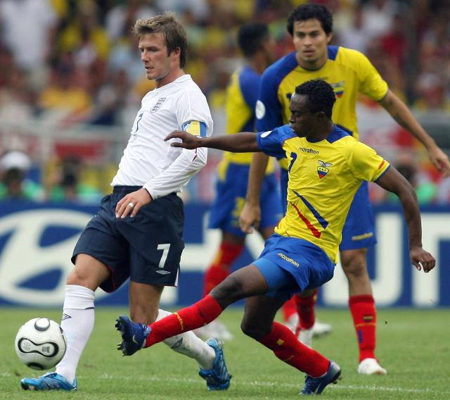 (FILES) Ecuadorean midfielder Christian Lara (R) challenges English midfielder David Beckham (L) during the round of 16 World Cup football match between England and Ecuador at Stuttgart's Gottlieb-Daimler Stadium, 25 June 2006. Ecuadorian police arrested former national team player Christian Lara and three other people on April 7, 2026, for an attempted robbery at a store in Quito. The offensive midfielder, who retired in 2018, was driving the vehicle in which the criminals were traveling, according to police. After foiling the robbery, officers seized three weapons, including a homemade submachine gun. (Photo by ADRIAN DENNIS / AFP)