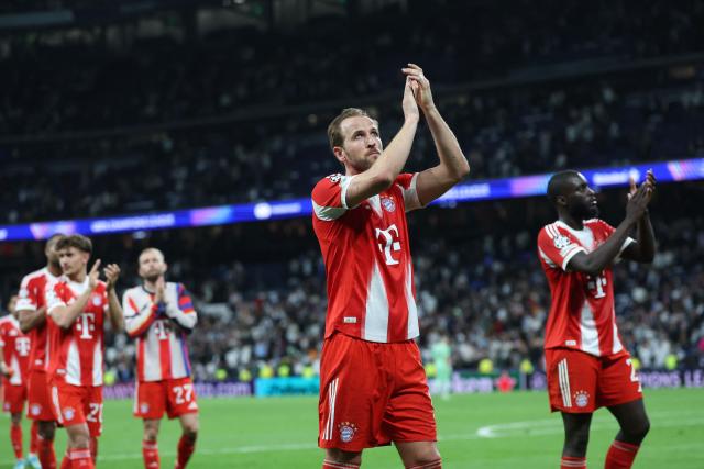 Bayern Munich's English forward #09 Harry Kane and Bayern players react after the UEFA Champions League quarter final first leg football match between Real Madrid CF and FC Bayern Munich at Santiago Bernabeu Stadium in Madrid on April 7, 2026. (Photo by Pierre-Philippe MARCOU / AFP)