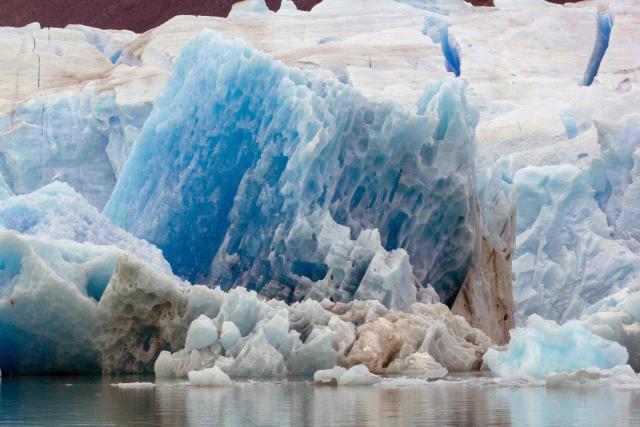 (FILES) Partial view of the Perito Moreno Glacier at Los Glaciares National Park near El Calafate, Santa Cruz province, Argentina, taken on June 8, 2025. Argentina’s Chamber of Deputies will debate on April 8, 2026 the government initiative that allows provinces to redefine protected areas around Andean glaciers in order to expand mining zones, despite resistance from environmental activists. Utra-liberal President Javier Milei' presented the amendment to the “Glaciers Law” as a necessary step to attract investment and is confident he has the votes to secure its final passage, following the Senate’s approval in February. (Photo by WALTER DIAZ / AFP)