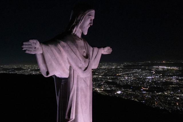 This aerial view shows the Christ the Redeemer statue on Corcovado mountain in the Tijuca Forest National Park in Rio de Janeiro, Brazil on April 7, 2026. (Photo by Pablo PORCIUNCULA / AFP)