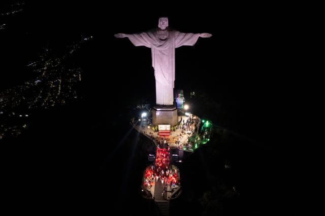 This aerial view shows the Christ the Redeemer statue on Corcovado mountain in the Tijuca Forest National Park in Rio de Janeiro, Brazil on April 7, 2026. (Photo by Pablo PORCIUNCULA / AFP)