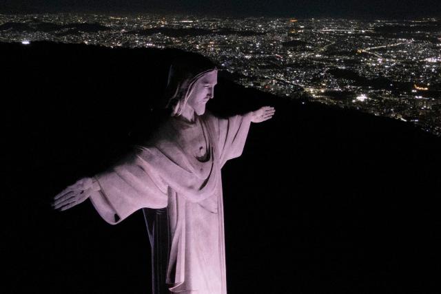 This aerial view shows the Christ the Redeemer statue on Corcovado mountain in the Tijuca Forest National Park in Rio de Janeiro, Brazil on April 7, 2026. (Photo by Pablo PORCIUNCULA / AFP)