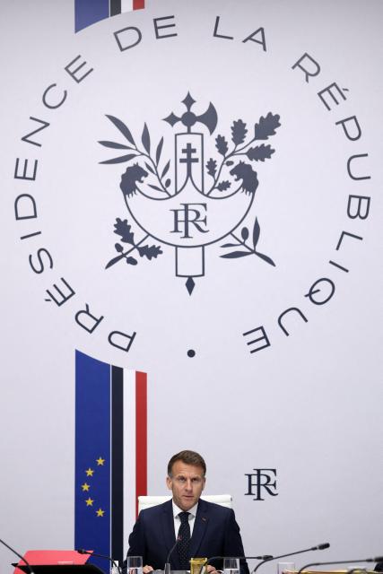 French President Emmanuel Macron (R) and Prime Minister Sebastien Lecornu attend a national defence council meeting on Middle East war at The Elysee Presidential Palace in Paris on April 8, 2026. French nationals, who spent more than three years in an Iranian prison on espionage charges, headed home from the war-stricken country on April, 7, 2026 Macron said. (Photo by Tom Nicholson / POOL / AFP)