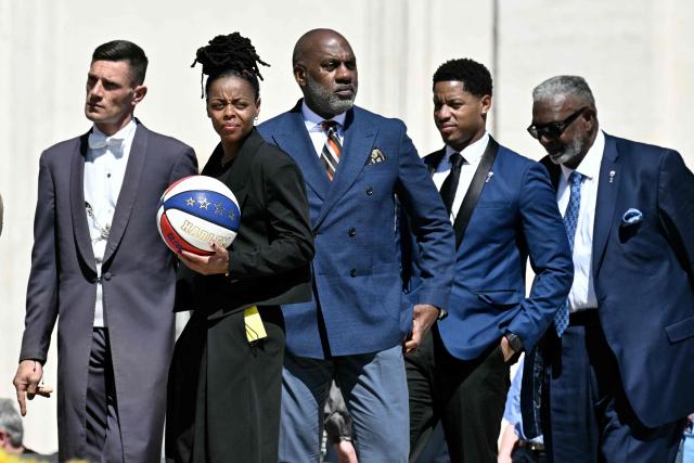 Members of the Harlem Globetrotters attend the weekly general audience at St Peter's Square in The Vatican on April 8, 2026. (Photo by Tiziana FABI / AFP)