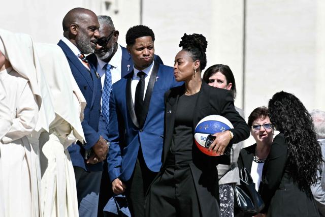 Members of the Harlem Globetrotters attend the weekly general audience at St Peter's Square in The Vatican on April 8, 2026. (Photo by Tiziana FABI / AFP)